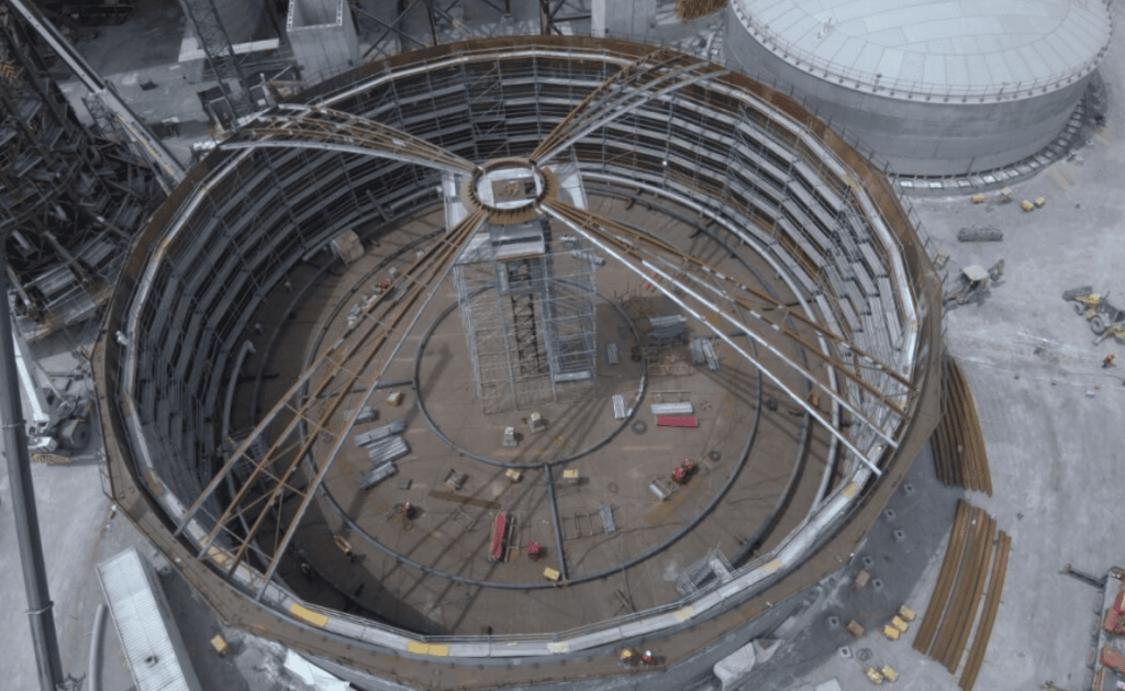 industrial tank under construction where welding heat treatments are applied